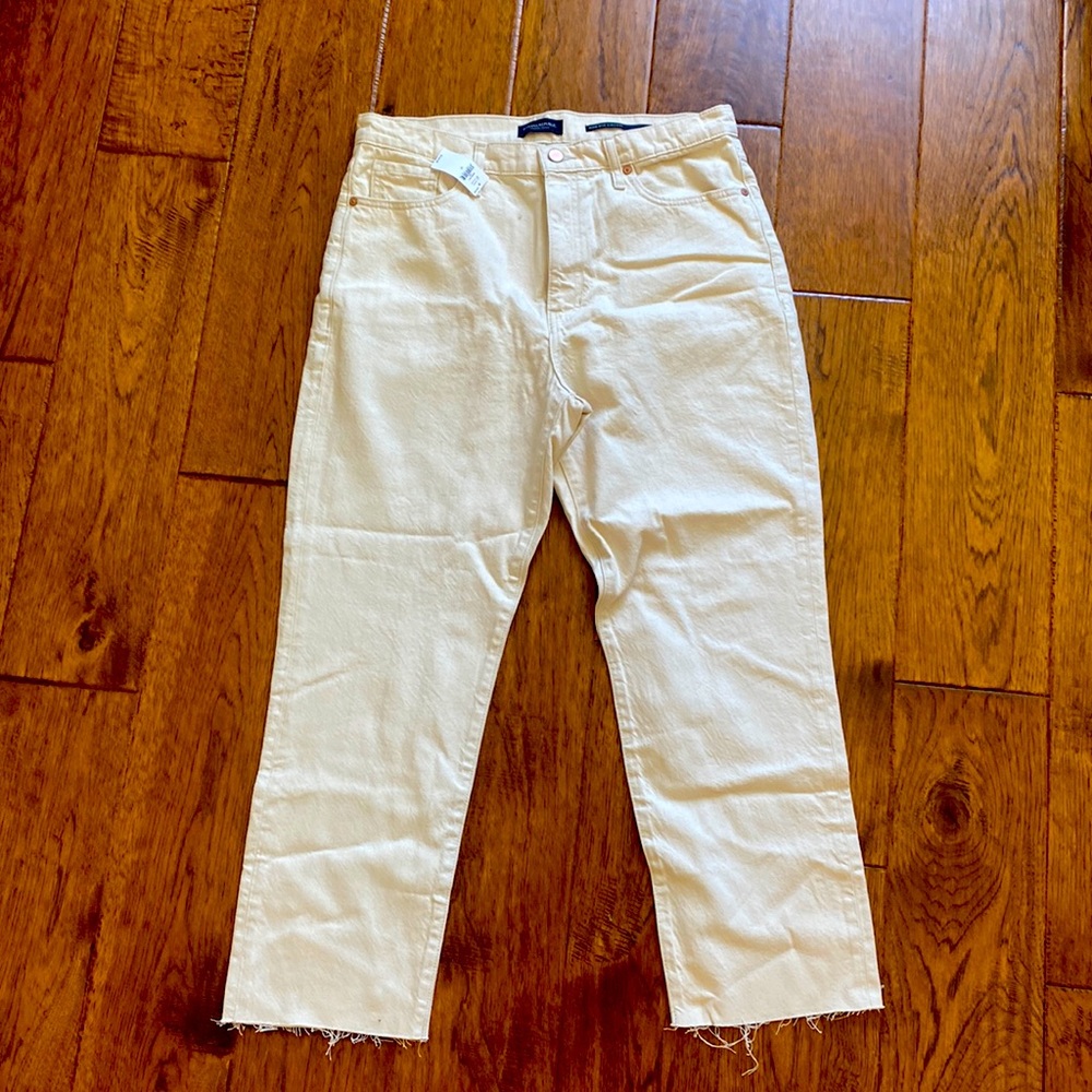 Ecru colored jeans.